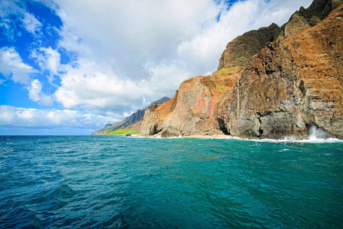 Mortgage buy down Kauaʻi — Nā Pali Coast cliffs and turquoise water